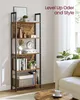 A bookshelf filled with decorative items and books in a living room setting. Produktbild-Vorschau