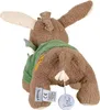 The back view of a brown plush toy with a green scarf and a music box attached. Anteprima dell’immagine prodotto