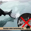 A hand in a black glove is using a gray and black ice scraper to remove snow and ice from a car windshield. A circular inset shows a different ice scraper with a red 'X' over it, implying it is not recommended. A logo for 'BIG DEAN' is also present. Produktbild-Vorschau
