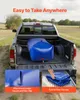 A blue water bladder is secured in the bed of a pickup truck, with inset images showing attachment loops and how to fold the bladder for storage. Náhled obrázku produktu