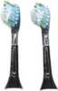 Two black Philips Sonicare C3 Premium Plaque Defense toothbrush heads with blue and green bristles, shown against a white background. Produktbild-Vorschau