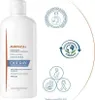A white bottle of Ducray Anaphase+ shampoo with various informational icons and text on the right side. Podgląd zdjęcia produktu