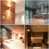 A collage of four interior design images showcasing different lighting and room styles. Produktbild-Vorschau