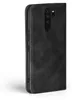A black flip cover phone case is shown from the side against a white background. Produktbild-Vorschau
