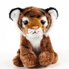 A stuffed toy tiger cub sitting on a white background. Produktbild-Vorschau