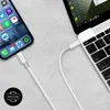A smartphone and a laptop are connected by a USB-C cable, suggesting data transfer or charging. Náhľad obrázku produktu