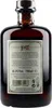 A close-up back view of a brown glass bottle of Remedy Spiced Rum. Náhled obrázku produktu