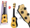 Ukelele para niños, instrumento musical de madera natural Vista previa de la imagen del producto 8