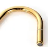 A close-up of a gold-colored kitchen faucet spout. Produktbild-Vorschau