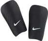 A pair of black Nike shin guards with white Nike logos. Produktbild-Vorschau