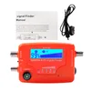 An orange satellite and TV signal finder device with a blue LCD screen, shown with its manual and connecting cables on a white background. Podgląd zdjęcia produktu