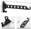 A black foldable wall-mounted clothes rack with dimensions indicated. Produktbild-Vorschau