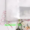 A close-up of a white sheer curtain with red text and a floral pattern visible behind it. A green measurement overlay is present. Produktbild-Vorschau