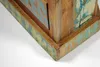 Close-up of the corner of a wooden shelf with a distressed, painted finish. Produktbild-Vorschau