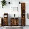 A bathroom vanity set with cabinets and a sink against a tiled wall. Podgląd zdjęcia produktu