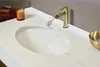 A bathroom vanity with a sink and faucet. Produktbild-Vorschau