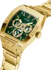 A close-up shot of a gold Guess watch with a green dial. Produktbild-Vorschau