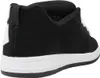 A side view of a black and white sneaker. Anteprima dell’immagine prodotto