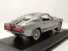 A silver 1967 Ford Shelby Mustang GT 500 Eleanor model car is displayed on a black stand against a white background. Produktbild-Vorschau