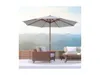 An outdoor patio scene with furniture and a large umbrella. Produktbild-Vorschau