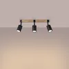 A ceiling light fixture with a wooden base and three black spotlights. Podgląd zdjęcia produktu