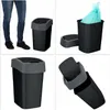 A collage of four images showing a black and gray trash can with a flip lid. One image shows a person's legs standing next to the trash can. Another shows the trash can with a blue trash bag inside. The other two images show close-ups of the trash can and  Podgląd zdjęcia produktu