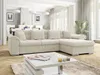 A modern living room with a sectional sofa, coffee table, and large windows. Náhled obrázku produktu