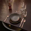 A table setting with plates, cutlery, and glasses. Náhľad obrázku produktu