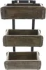 A three-tiered wooden shelf unit with three open wooden boxes. Produktbild-Vorschau