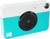A studio shot of a Kodak Printomatic instant camera. Podgląd zdjęcia produktu