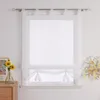 A white sheer Roman blind is shown hanging in a window. Produktbild-Vorschau