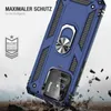 A blue phone case with a ring holder is shown in a dynamic, action-oriented scene with debris flying around, suggesting durability and protection. Produktbild-Vorschau