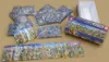 A large jigsaw puzzle box and its contents are laid out on a brown surface. Produktbild-Vorschau