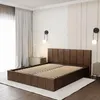 A bedroom setting with a bed. Produktbild-Vorschau