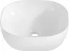 A white ceramic sink with a drain hole in the center. Produktbild-Vorschau