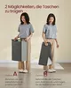 Two women demonstrating two different ways to carry a laundry basket. Produktbild-Vorschau