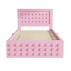 A pink bed frame with a headboard and footboard designed to resemble building blocks. Anteprima dell’immagine prodotto