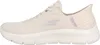 Side view of a beige Skechers sneaker. Voir les images du produit