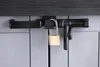 Close-up of a lock and latch mechanism on a storage unit. Náhled obrázku produktu