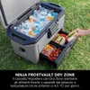 A cooler filled with ice and drinks, with a drawer pulled out showing food items. Produktbild-Vorschau