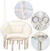A collage of images showing a beige hanging chair with cushions and close-ups of its rope construction and metal rings. Podgląd zdjęcia produktu