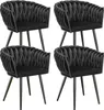 Four black dining chairs arranged in a 2x2 grid against a white background.