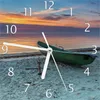 Wallario Design Wanduhr Einsames Fischerboot mit Anker am Produktbild-Vorschau 1