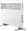 A white Xiaomi smart space heater is shown from a three-quarter side view, standing on its grey feet. Produktbild-Vorschau