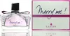 A perfume bottle and its packaging are displayed side-by-side against a white background. Podgląd zdjęcia produktu