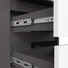 Close-up view of the interior of a cabinet or dresser, showing drawer slides and the inside of two drawers. Produktbild-Vorschau