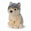 A plush toy wolf sitting on a white background. Podgląd zdjęcia produktu