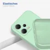 A close-up view of a mint green phone case, showing the camera cutout and the inner lining of the case. Produktbild-Vorschau