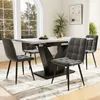 A dining room scene with a table and chairs. Anteprima dell’immagine prodotto