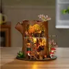 A miniature fairytale tree house model with interior lighting. Podgląd zdjęcia produktu